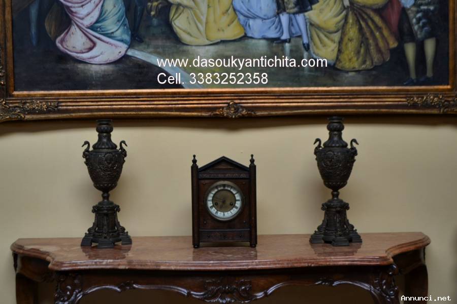 Antica coppia di candelabri in bronzo del 900