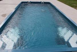 piscina in vetroresina 6,6x3,2x1,5 scale interne impostato
