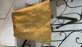 Vendo borsa in tessuto colore oro