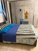 Camera  da letto moderna curata e multifunzionale  