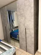 Camera  da letto moderna curata e multifunzionale  