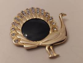 Centrale in argento dorato 800 a forma di pavone con onice nero incastonato 