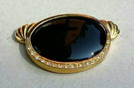 Centrale per collana singola o a più fili, in onice nero ovale, incastonato su montatura in metallo 