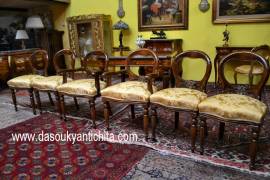 Coppia di capotavola con gruppo di quattro sedie stile Vittoriano