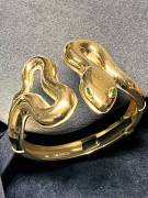 Bracciale serpente in argento 925 placcato oro 18Kt con perodoti verde negli occhi 