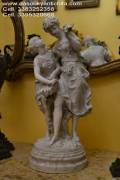 Statua in porcellana raffiguranti fanciulle con fiori firmato M. Moreau