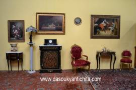 Poltrona dorata in tessuto damascato rosso stile Barocco