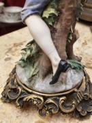 Statuina in porcellana fanciullo di Benacchio Triade