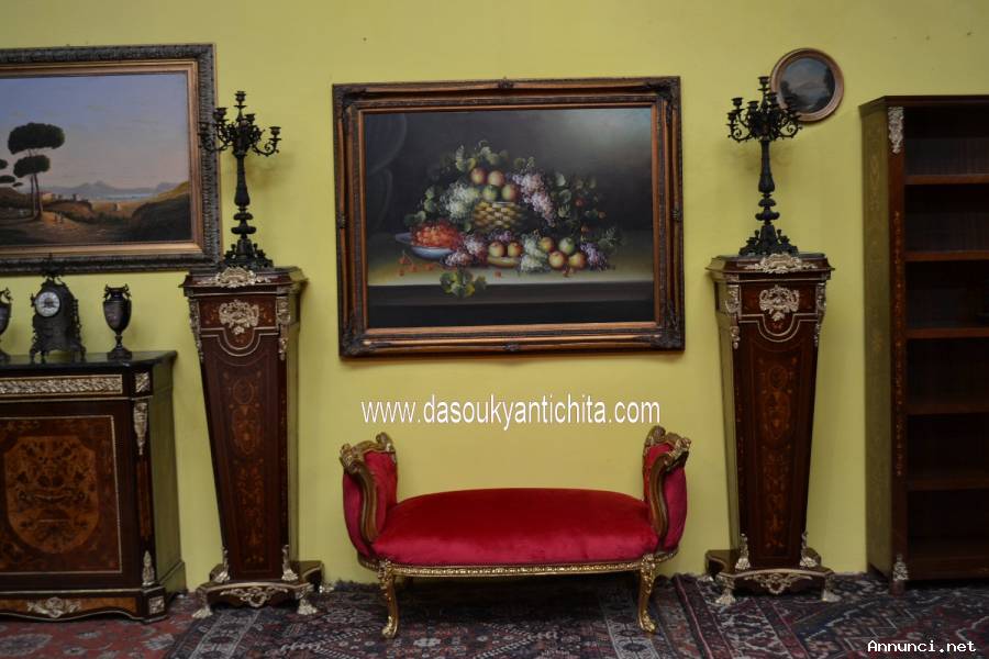 Antica coppia di candelabri in bronzo