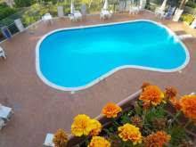 Via Caravaggio in prestigioso parco con piscina ampio appartamento ben rifinito