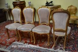 Gruppo di quattro sedie dorate stile Luigi XV