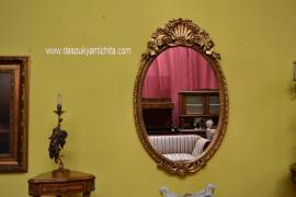 Specchiera ovale dorata stile Barocco
