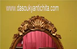 Specchiera ovale dorata stile Barocco