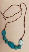Collana etnica girocollo con cordoncino(a misura variabile) perle vetrificate azzurre  