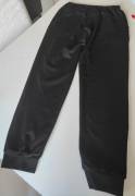 Pantalone nero con fascia elastica in vita e polsini alle caviglie per una vestibilità comoda Marca 
