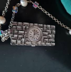 Orologio vintage pendente NUMA Rossi G. 17 Jewels Swiss made meccanico dimensioni cm . 5 x cm .2 Orologio vintage pendente NUMA Rossi G. 17 Jewels Swiss made meccanico dimensioni cm . 5 x cm .2