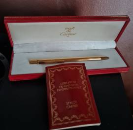 Penna a sfera STYLOS MUST DE CARTIER   vintage con custodia e garanzia  serie 0 79442  del 20.10.95,