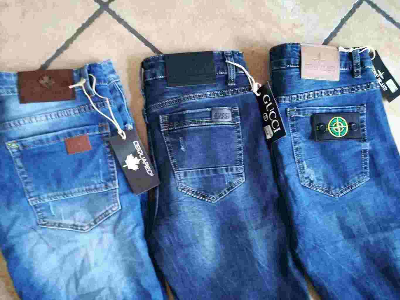 jeans uomo modello slim gucci , dsquared , stone island slim